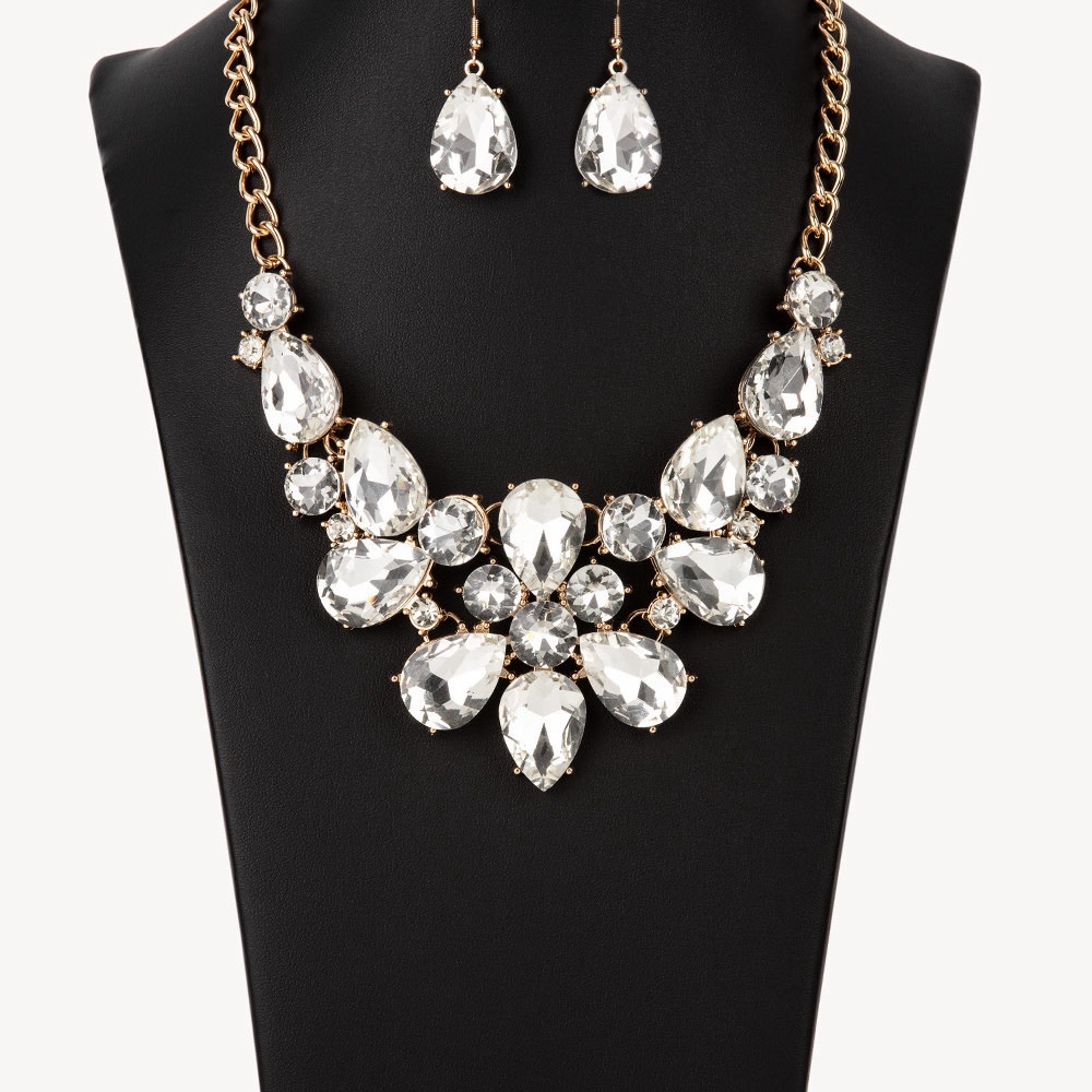 White stone necklace with matching earrings